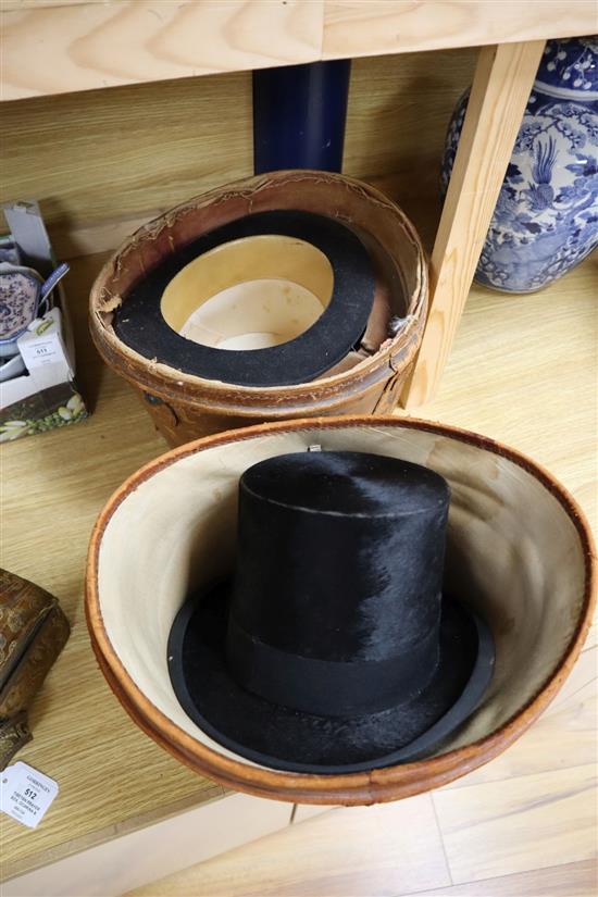 Two Victorian top hats, boxed